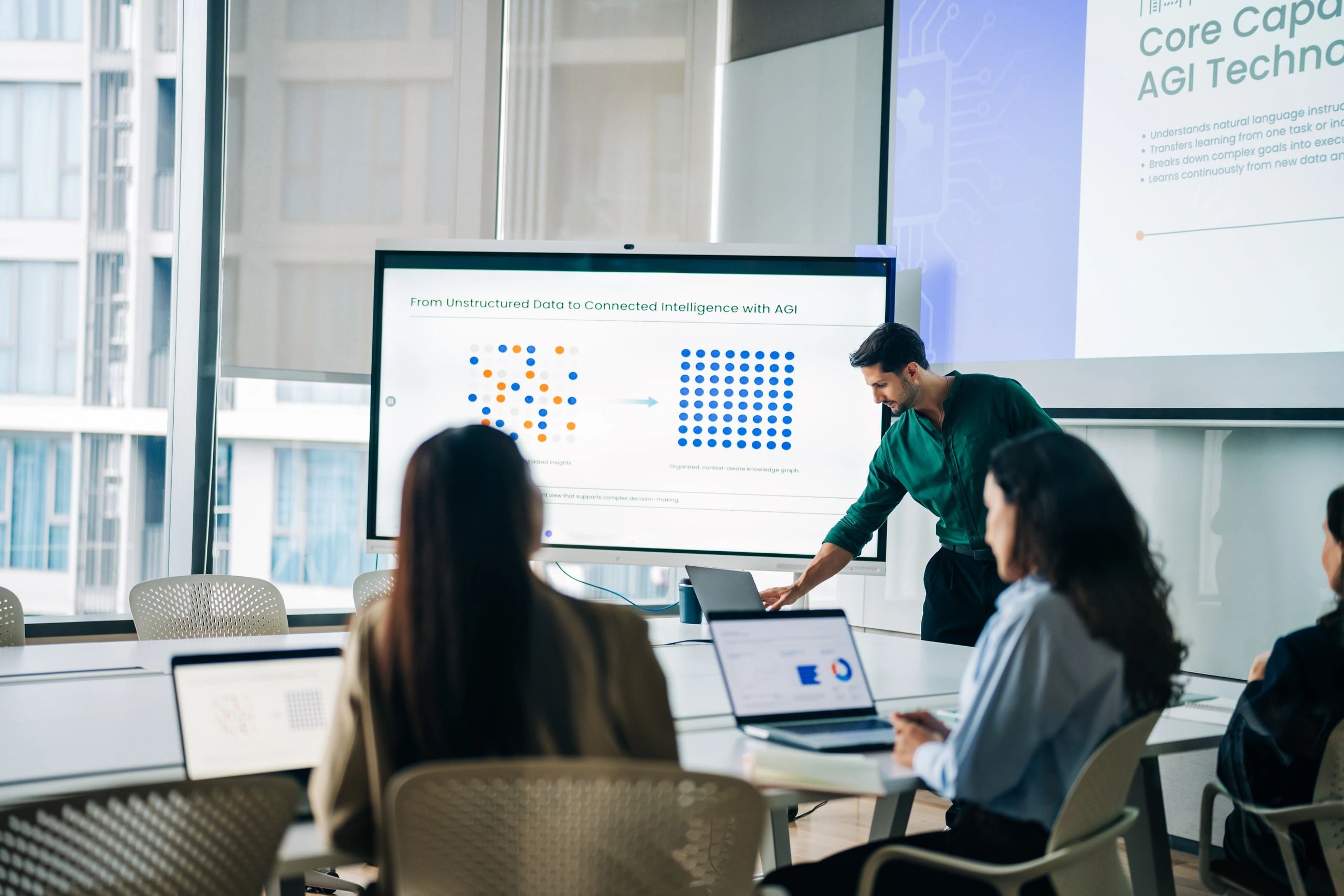 Professional presenting analytics on a digital screen